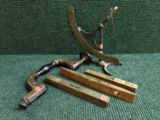 A basket of iron and brass yarn scale, wood and brass Victorian brace,