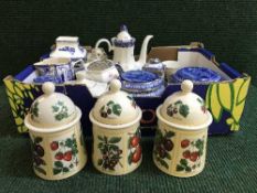 A box of assorted Ringtons caddies, storage jars,