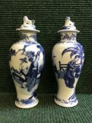A pair of Chinese porcelain vases and covers a/f