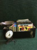 A basket of 78's, family bible, annuals,