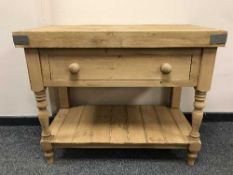A reclaimed pine butcher's table fitted a drawer,
