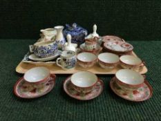 A tray of Ringtons teapot, tea service, Doulton milk jug, thimbles,
