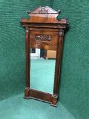 A late 19th century carved mahogany framed mirror