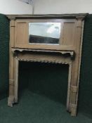 A late 19th century mirrored fire surround