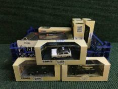 A basket of boxed Burago Jaguar 120 Roadstar, Corgi Classic bus,