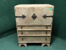A Waring and Gillows oak linen chest