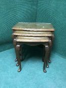 A nest of three burr walnut tables