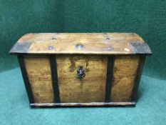 An antique pine metal bound trunk with key,