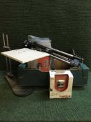 A boxed Yamaha Portatone keyboard, box of camera, tripods, router,