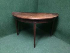 A Victorian mahogany d-shaped table