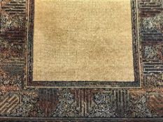 A contemporary woolen rug on blue ground