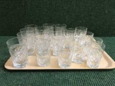A tray of assorted lead crystal whiskey tumblers