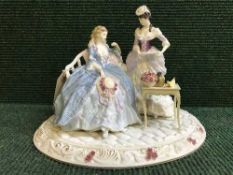 A Coalport figure - The Coalport Heirloom figure of the Year 2000 in celebration of Coalports 250th