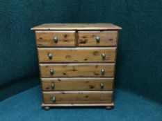 A pine six drawer chest