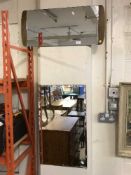 A 1970's mirror on teak board and one other mirror