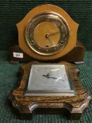 A walnut cased Bentima mantel clock and a oak cased barometer