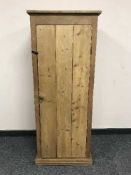A reclaimed pine single door cupboard,