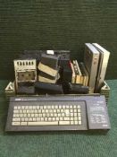 Four boxes of vintage PC equipment - Amstrad 128k colour personal computer, Commodore V20,