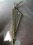 Three lengths of brass rail