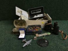 A box of 9ct gold band, silver necklace set, fly fishing cigarette cards,