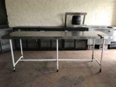 A stainless steel prep table