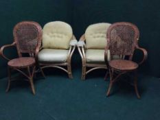 A pair of bamboo conservatory armchairs and a pair of bamboo & wicker armchairs