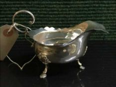 A Sterling silver cream jug (marks rubbed)