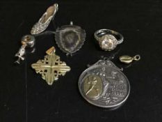 A pendant stamped 14k, a silver and gold mounted Liverpool teacher's Association medal,