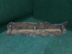 A driftwood wall shelf