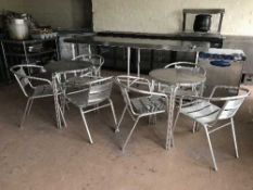 Three circular cafe tables and six chairs