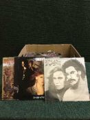 A box of assorted LP records - Rush, Hall & Oates,