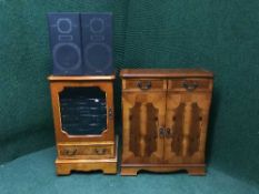 An inlaid yew wood hi/fi cabinet continuing Philips hifi with speakers,