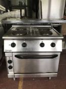 A stainless steel Mareno four ring gas oven