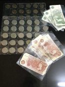 A Royal Mint 1986 proof set, 6 ten shilling notes, 3 one pound notes,