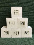 Thirty five boxes of assorted ceramic tiles