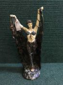 A large Art Deco style figure