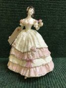 A Coalport Heirloom Figure of the Year 1997 - Olivia numbered 6309/19997 with certificate