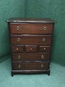 A Stag Minstrel seven drawer chest
