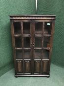 An oak double door bookcase