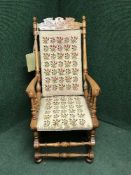 A carved mahogany rocking chair