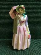 A Royal Doulton figurine - Miss Demure
