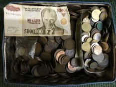 A tin of early 20th century copper coins,