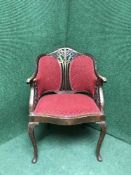 A late 20th century elbow chair