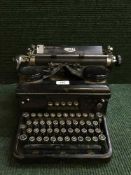 A de-humidifier, vintage Royal typewriter,