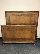 A pair of 4' carved oak bedends