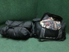 A Coleman tent and two sleeping bags