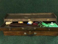 Two stained pine boxes containing gun cleaning equipment