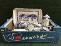 A box of Ringtons blue and white ware, mahogany framed Coulson print,