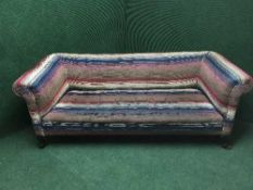 An early 20th century upholstered settee