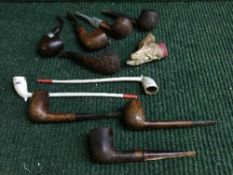 A basket of ten vintage pipes